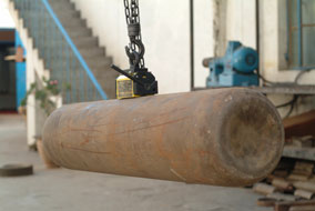 Magnetic Lifter being used to handle a oxygen cylinder